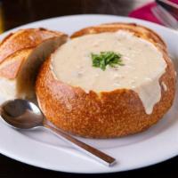 Clam Chowder · New England style clam chowder. Cream based with potatoes and pancetta. Choice of size.