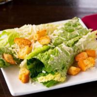 Classic Caesar Salad · Heart of romaine lettuce with house-made croutons, fresh garlic, parmesan cheese, and our ow...