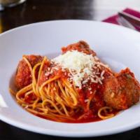 Linguini & Meatballs · Home-made meatballs in a hearty garlic tomato sauce topped with romano cheese.