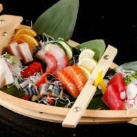 Sashimi Combo (12) · Consuming raw or undercooked meats, poultry, seafood, shellfish or eggs may increase your ri...