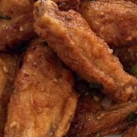 84. Hot Spicy Garlic Chicken Wings · Hot and spicy.