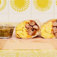 Turkey Sausage Breakfast Burrito · Two scrambled eggs, turkey sausage, breakfast potatoes, and melted cheese wrapped in a fresh...