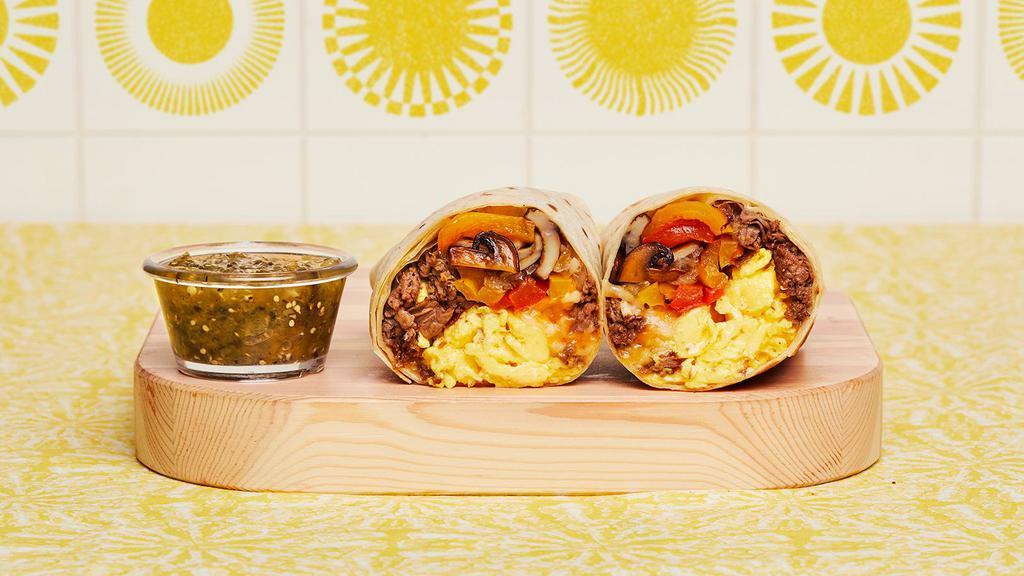 Philly Cheesesteak Breakfast Burrito · Two scrambled eggs, chopped steak, grilled onions and peppers, sauteed mushrooms, and melted cheese wrapped in a fresh flour tortilla.