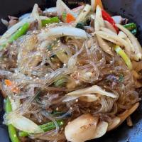 Beef & Vegetable Glass Noodle Dish / 잡채 · Glass noodle mixed with beef and assorted vegetables in sweet soy sauce.