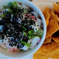 Ceviche · Fresh Rock Cod ,  young coconut,  Lime. , and green onion. Topped with toasted black sesame ...
