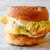 Fish Fry Sandwich · Beer battered Rock Cod on a  Kaiser roll. Served with American cheese, shaved iceberg lettuc...