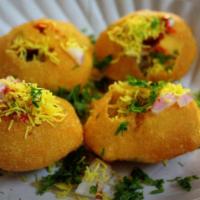 Sev Batata Puri · Combination of puri, sev (deep fried gram flour noodles), boiled potatoes (batata), onion an...