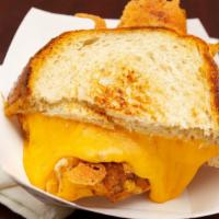 Grilled Cheese Sandwich · Melted cheddar cheese on sourdough.