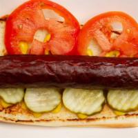 Hotdog, Deep Fried · 100% beef quarter pound, eight-inch doggie, mustard, pickle, tomato.