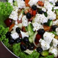 Greek Salad · mix green, tomatoes, cucumber, onion, black olives, feta.