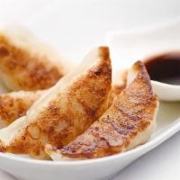 Potstickers (锅贴) · 8 pan-fried potstickers - Chicken OR Vegetable.