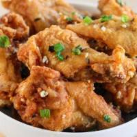 Fried Chicken Wings (炸鸡翅) · 8 pieces. Mild kick.