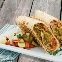 Falafel Wrap (Vegan) · Falafels, hummus, tomato, cucumber, persian pickles, pickled turnip and tahini. Vegan.
