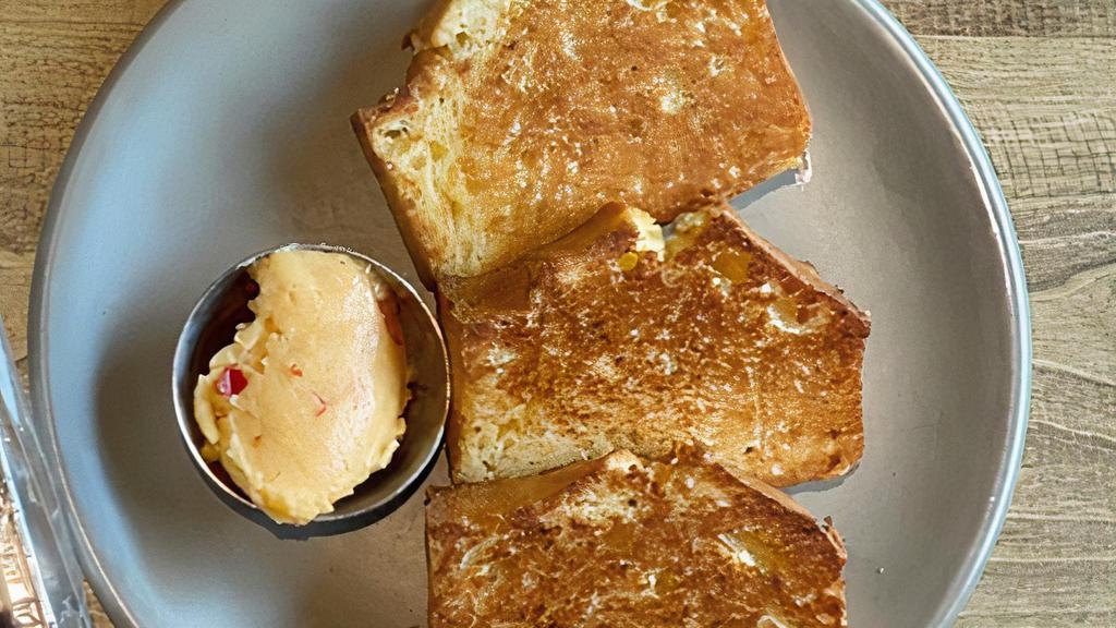 Griddled Cornbread · Calabrian Chili-Honey Butter. (3 Slices)