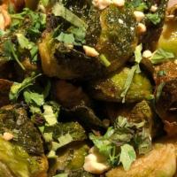 Crispy Brussels Sprouts · Gluten free. Chili, Lime, Ginger, Fish Sauce, Cilantro, Mint, Peanuts. (Cannot be made witho...