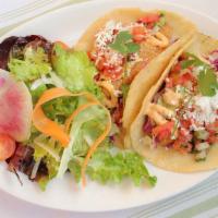 Fish Tacos (2) · Gluten free. House made Tortilla, Fried Wild Cod, Pico de Gallo, Chipotle Cream, Avocado, Pi...