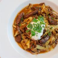 Beef Stroganoff · Buttered Noodles, Herbed Sour Cream, Mushrooms, Onion.