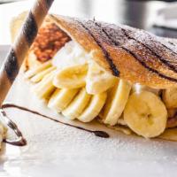 Chocolate Banana Crepe · Our Chocolate Banana Crepe comes with one crepe  , one scoop of chocolate ice cream, whipped...