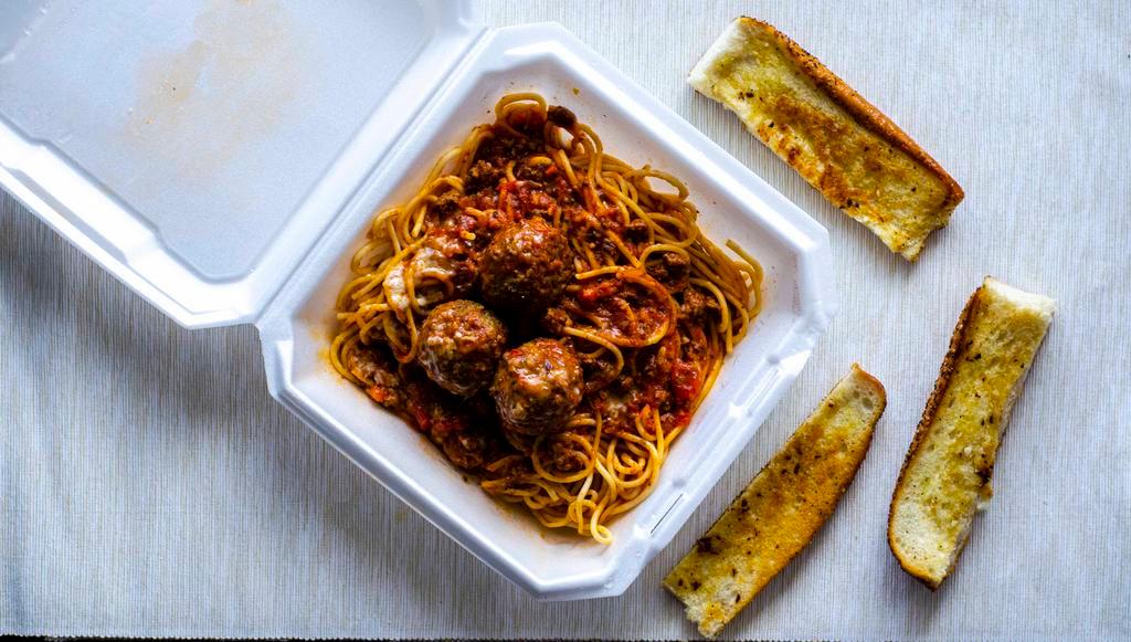 Spaghetti with Meatballs · Tossed in a mild meat sauce with homemade meatballs.