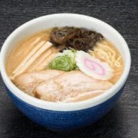 Miso Ramen · Miso flavored ramen topped with roasted pork, scallions, mushrooms, bamboos, fish cake, sesa...