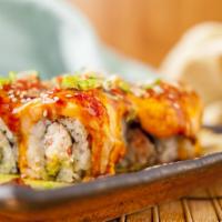 Lion King Roll (8 pcs) (Spicy) · California roll with baked salmon, green onion, special sauce on top.