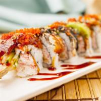 Dragon Roll (8 pcs) · Shrimp tempura & crab meat inside with eel & avocado outside.