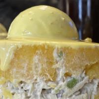 Causa Rellena de Pollo · Layered mashed potatoes, red onions & mayo - chicken.