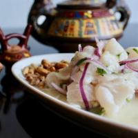 Ceviche Classico · Gluten-free, dairy-free. Fish, red onions, cilantro, lime juice. Served with dried corn & sw...