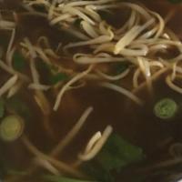 65. Bún Bò Hue · Hue's spicy beef rice noodle soup.