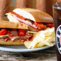 Fear Factor Epic Sub · Spiced ham, salami, mayo, dijon mustard, provolone, roasted red peppers, caramelized onions.