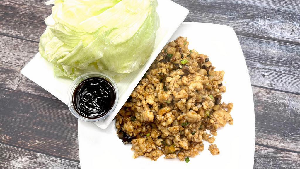 D. Chicken Lettuce Cup · Minced chicken sauteed with bamboo shoot, water chestnut, black mushroom, green onion and pine nuts. Served with lettuce and hoisin sauce.