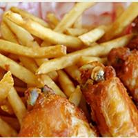 Chicken Wings · Our favorite juicy and crispy wings with fries!