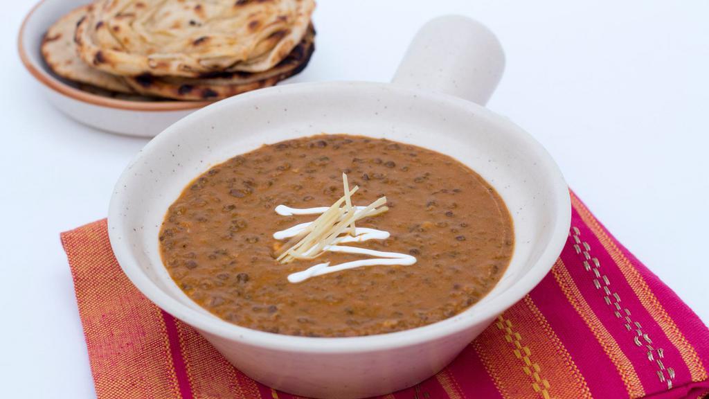 Lalla Mussa Dal · Signature black lentils simmered overnight on slow fire.