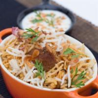 Dum Gosht Biryani · Chef Recommended -Long-grain basmati rice cooked with tender mutton and aromatic spices.