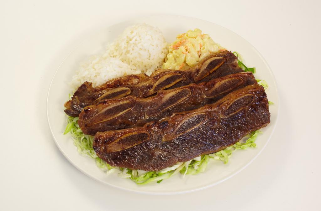 Hawaiian Bbq Short Ribs Plate · Juicy beef short ribs marinated in our house BBQ sauce and grilled to perfection. Side come with Two scoops of Rice and One Macaroni salad.