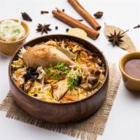 Hyderabadi Dum Biryani · Chicken cooked with exotic spices and saffron flavored basmati rice.