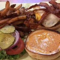 The Hangover Burger · Topped with fried egg, bacon, American cheese and chipotle mayo.