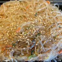 Japchae (Stir-Fried Glass Noodles) · Stir-fried glass noodles with vegetables.