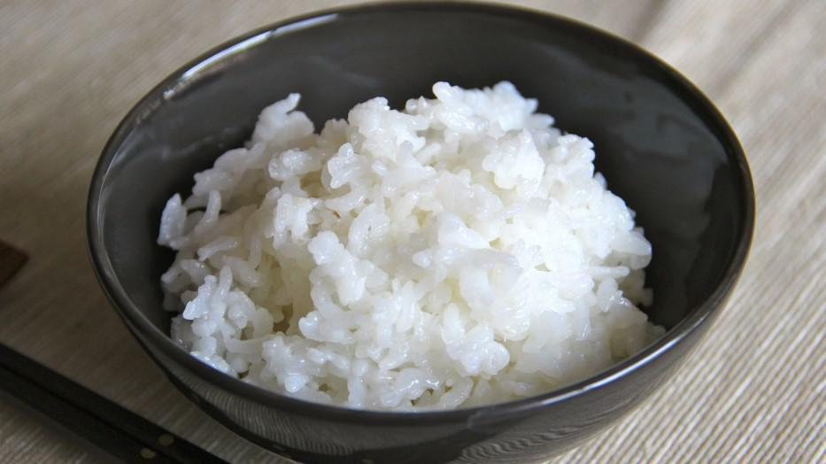 Steamed Rice · A bowl of sticky rice.