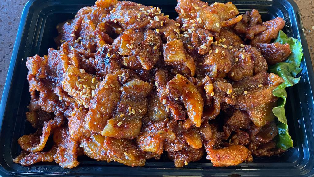 Spicy Pork BBQ (Pork Bulgogi) · Pork BBQ in spicy sauce. Comes with steamed rice and side dishes.