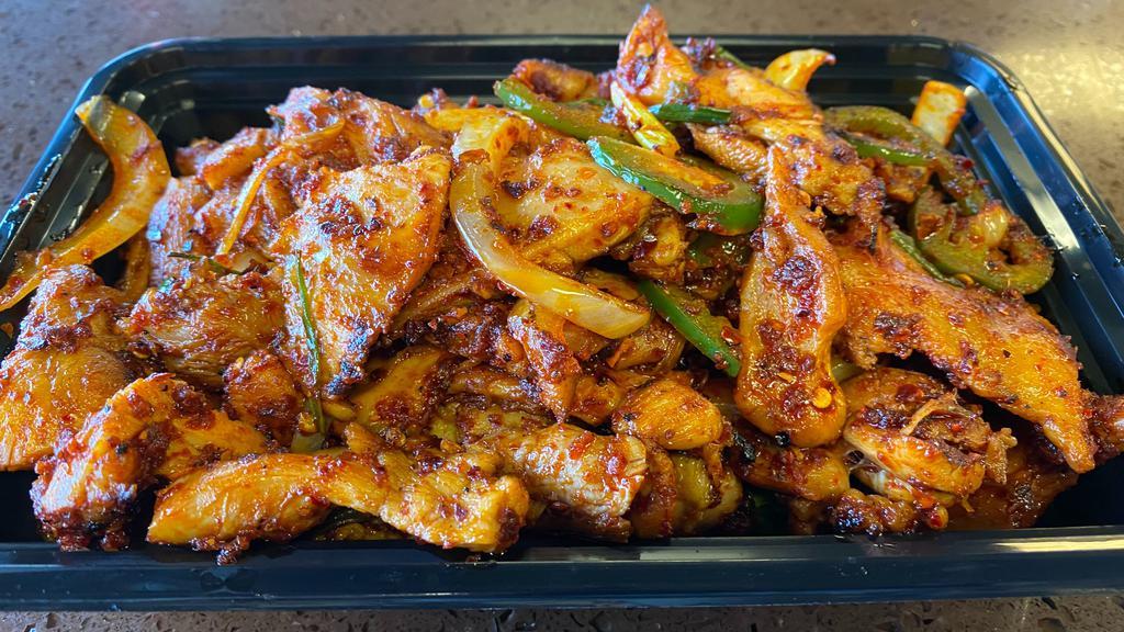 Spicy BBQ Chicken · Chicken BBQ in spicy sauce. Comes with steamed rice and side dishes.
