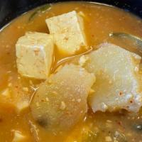 Bean Paste Soup (Doenjang Jjigae) · Bean paste soup with tofu and vegetables. Comes with steamed rice and side dishes.