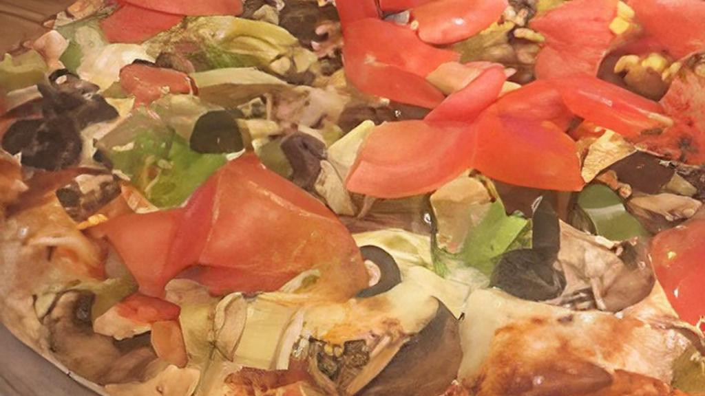 Small The Veggie · Red Sauce, Mushrooms, Onions, Green Bell Peppers, Black Olives, Artichoke Hearts and Fresh Tomato.