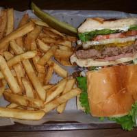 Deluxe Burger · 1/3 lb. beef patty, Canadian bacon, Swiss cheese, lettuce, tomato, onion, mayo, mustard, & r...