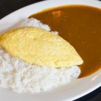 Omelette Curry · Omelette served with curry sauce. Vegetarian option available.