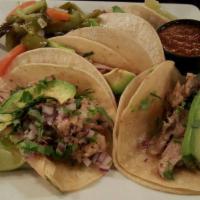Crispy Taco Combo Plate · Crispy taco filled with your choice of chicken or ground beef. Served with pork carnitas.