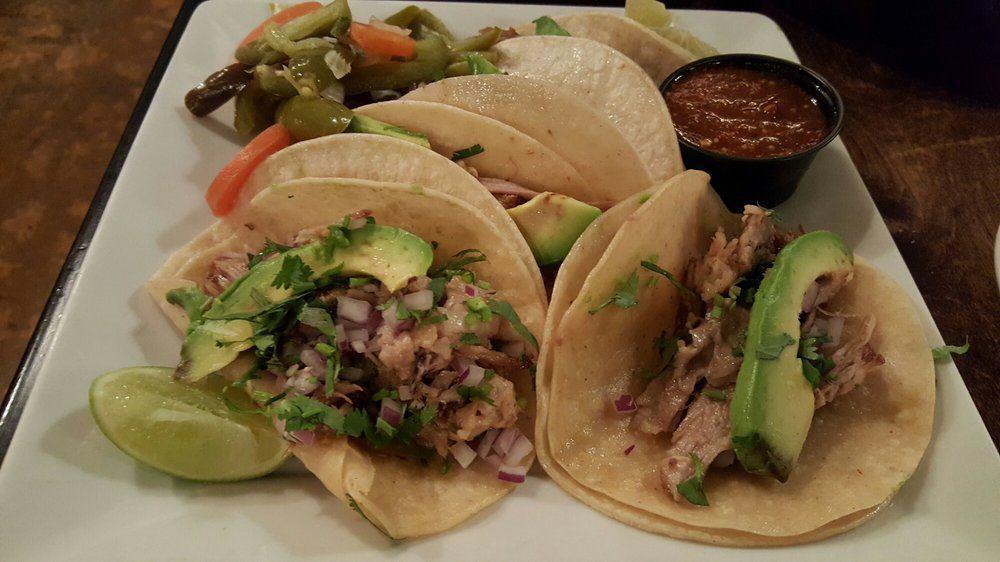 Crispy Taco Combo Plate · Crispy taco filled with your choice of chicken or ground beef. Served with pork carnitas.