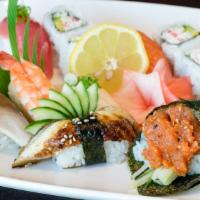 Nigiri Sushi Deluxe Dinner · 8 pcs nigiri sushi , California roll, Spicy tuna handroll