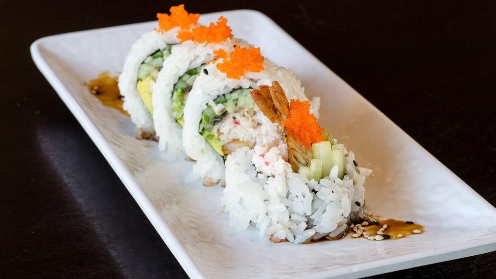 Drunken Fish Roll · Shrimp tempura, unagi, crab salad, avocado, cucumber, masago, sauce.