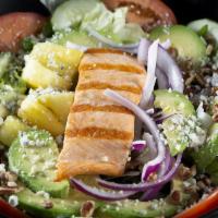 401. Café Maul Salad · Mixed greens, grilled salmon, avocado, pineapple, tomatoes, cucumber, red onions, topped wit...